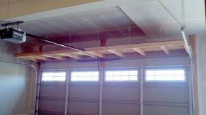 After installing the first one at 48 deep, i realized that was deeper than i wanted, so i made the second. Building Overhead Garage Storage Shelves Overhead Jose L Diy Overhead Garage Storage Garage Storage Solutions Diy Garage Shelves