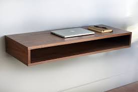 These floating computer desks look amazing! Amazon Com Walnut Floating Desk Furniture Decor