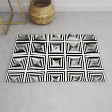 black white trippy squares rug by