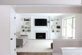 white built ins around the fireplace