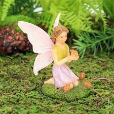 Fairy With Little Birds Kneeling Fairy