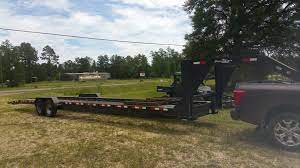 With a motor home, unless you tow a car behind you (which further reduces already low gas mileage), you have to unhook toy haulers (shown above) are travel trailers with extra space that acts as a sort of garage for small, fun toys like dirt bikes. Car Hauler Trailer Rental 38ft Dual Axle