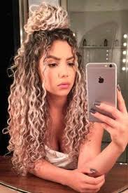 As much as she loves to create, she also loves to teach, ensuring each client understands how to recreate the look at home. 10 Super Easy Ways To Style Curly Hair In The Summer Society19