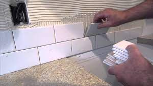 Floor or wall, indoors or out, tile type and size are factors. How To Install A Simple Subway Tile Kitchen Backsplash Youtube