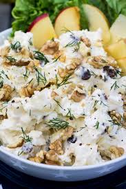 Use a small knife to peel off and discard the potato skins (a tea towel will help with holding the warm potatoes). Creamy Potato Salad With Apples Raisins And Walnuts Www Oliviascuisine Com Potato Salad With Apples Creamy Potato Salad Potato Salad Recipe With Apples