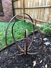 Rusty Metal Ring Sculpture Sculptures