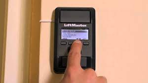 how to program liftmaster timer to
