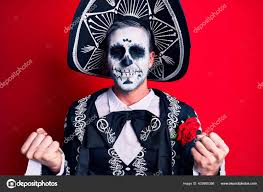young man wearing mexican day dead