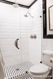 shower with glossy white beveled tiles