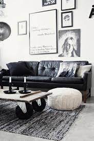 Living Room With A Black Leather Sofa