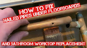 nailed heating pipe under floorboards