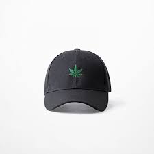 black baseball cap with cans leaf