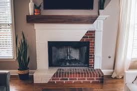 modern white brick fireplace walnut