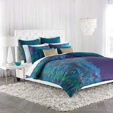 bedroom with green blue and purple