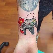 Be as timeless as the multinational consumer electronics and video game company when you use this free nintendo font called pretendo. Rising Dragon Tattoos Nyc Nintendo 64 Controller By Edd Edcuellar