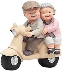 loving elderly couple figurines