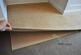 how to keep a rug in place on carpet