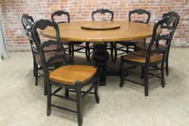 Perimeter leaf round dining room table cognac finish. Round Tables Lake And Mountain Home
