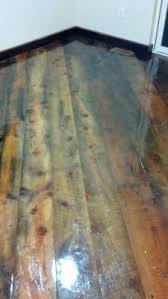 Simply abrading the floor and applying a new top coat might not fix the problem. Clear Epoxy Over Reclaimed Wood Epoxy Com News And Tips