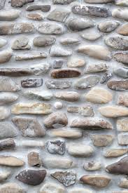 Rock Wall Of Natural River Stones Wall