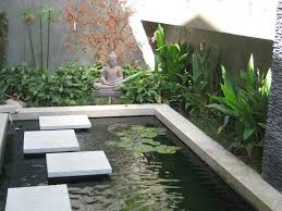 Contemporary Koi Pond With Waterfall