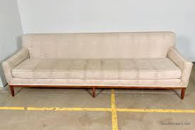 8 ft sofa with walnut base by