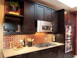 Instead of sanding, chris and lexi use mineral spirits and a rough scrubbing pad to clean the cabinets thoroughly before priming them. Restaining Kitchen Cabinets Pictures Options Tips Ideas Hgtv