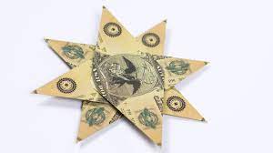 Open the flap and squash down. Dollar Origami Star Making An Origami Christmas Star Out Of Money Youtube