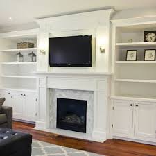bookcases around fireplace family room
