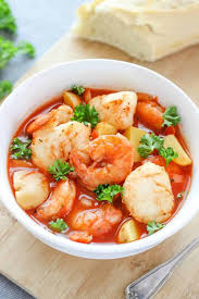 This traditional italian christmas dinner includes at least seven different types of seafood. Slow Cooker Seafood Stew Recipe I Heart Naptime