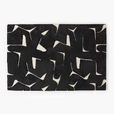 sway tufted black and white area rug 6