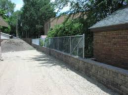 Fence On Top Of Retaining Wall Fine