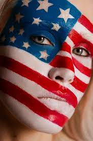 front view woman posing with usa makeup