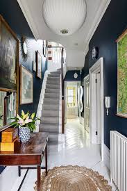 a light victorian townhouse with teal