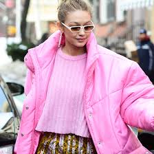 As seen on the runway, this satin race jacket takes a victory lap in a part of an exclusive capsule collection designed by gigi hadid and tommy hilfiger. Gigi Hadid Is Pretty In Pink In An Oversized Bubblegum Coat And Matching Makeup In New York City Vogue