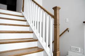 wooden handrail on split level stairs