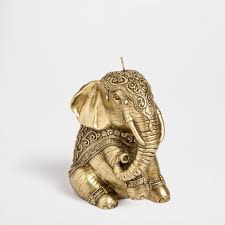 These elephant decor items will add a touch of class to any room in your home. Golden Seated Elephant Candle Candles Decor And Pillows Zara Home United States Elephant Candle Elephant Decor Zara Home Accessories