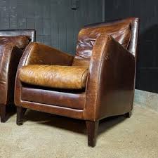 weathered armchair in dark brown