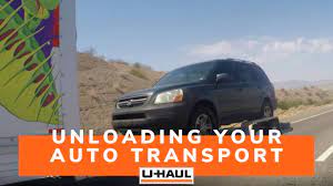 Unloading Your U-Haul Auto Transport | Towing A Car | Car Hauler - YouTube