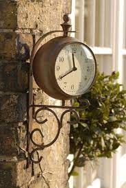 Antique Rust Outdoor Clock And