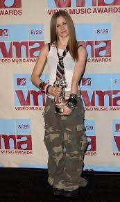 Lavigne's debut studio album, let go (2002), included the. The Style Evolution Of Avril Lavigne Stylebistro