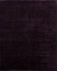 solid eggplant s wool rug from the