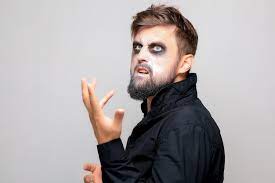 halloween makeup on a bearded man