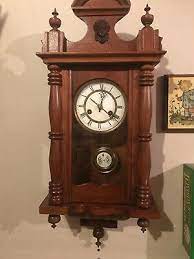 wall clock with r a pendulum c 1900