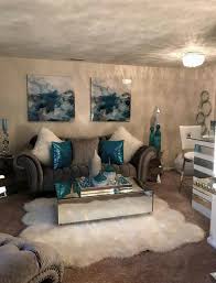 This living room layout relies on the unconventional use of a deep blue color on the walls, highlighted and accented by bold, ornate. Brown And Silver Living Room Lovely Blue And Silver Living Room Designs Zeppe Living Room Turquoise Teal Living Rooms Silver Living Room