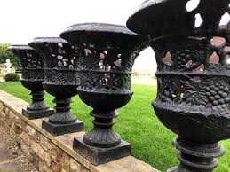 Set Of Four Cast Iron Urns Pierced And