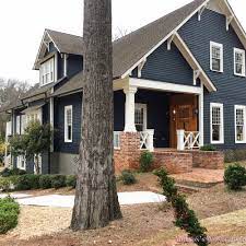 exterior craftsman home house dark blue
