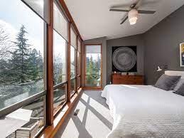 bedroom with floor to ceiling windows