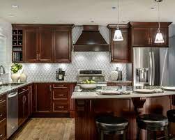 Look at our examples where cabinets are used not only as storage but as a design element with multiple cabinet ideas. Kitchen Design Ideas Cherry Cabinets