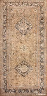 oversized antique persian khoran rug